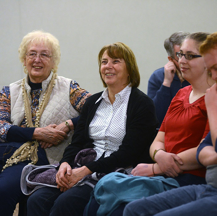 A group of people sharing poetry.